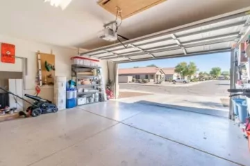 When Your Garage Door Opens on its Own: Causes and Solutions